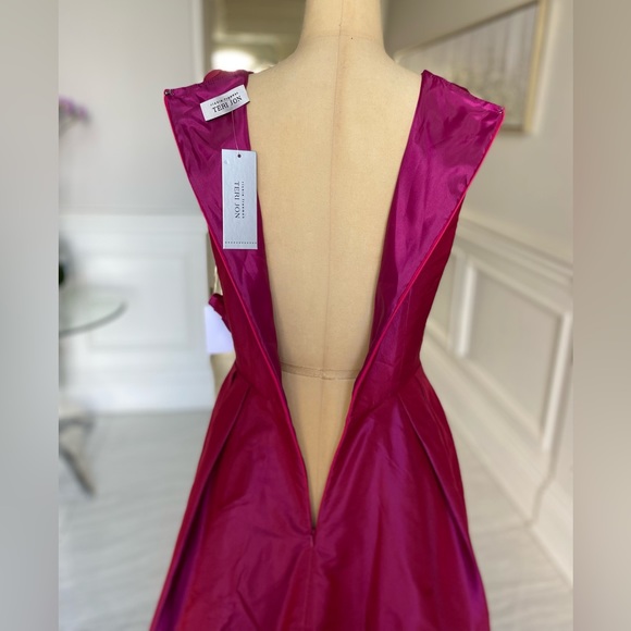 RICKIE FREEMAN FOR TERI JON
High-Low Taffeta Gown w/ Flower Applique - Picture 4 of 7